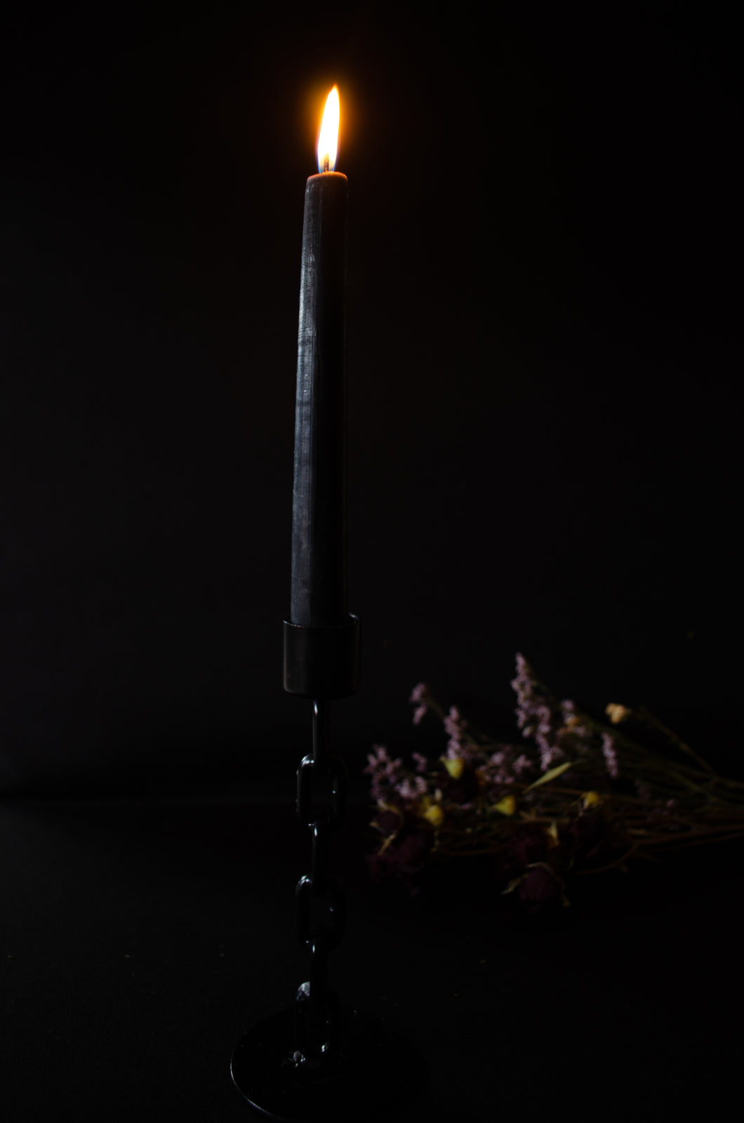 Black beeswax taper candle