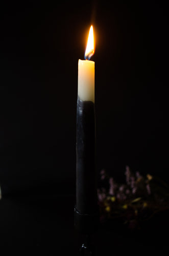 White and black beeswax candle